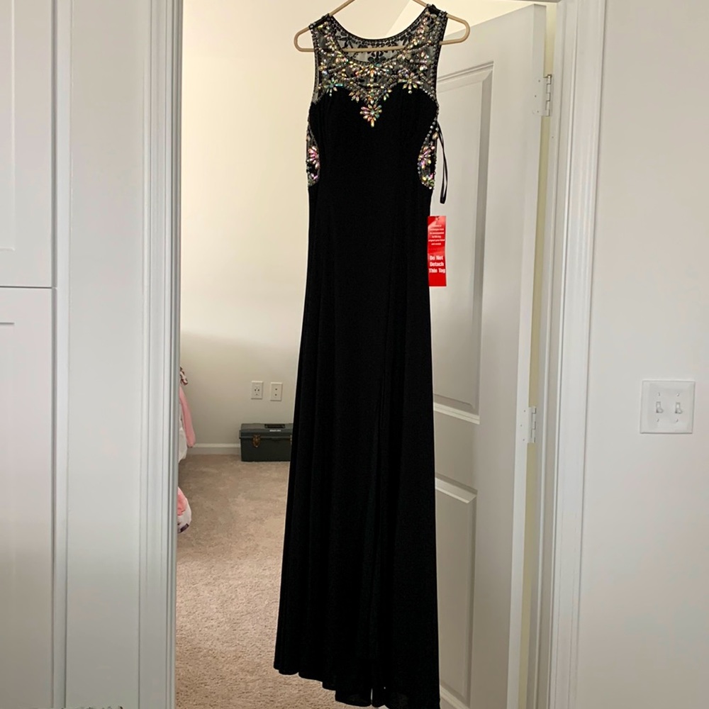 Black gown with sequins.